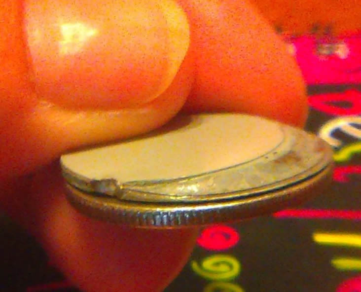Nickel-Stuck-On-Quarter?